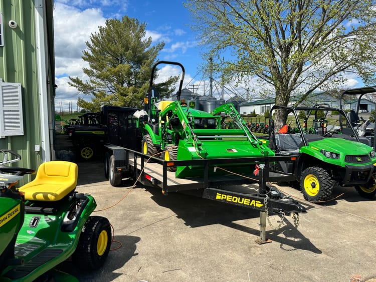 Tandem Trailer with 1025 + Loader & Backhoe